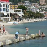 Albania, Saranda city - swimming area in the harbor; the cement