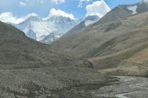 Bleak treeless slopes and cold running streams  along very rocky