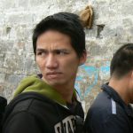 Tibet, Lhasa: handsome visitor waiting in line for Potala Palace