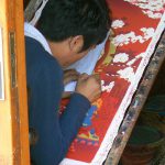 Tibet: Lhasa - artist painting a tanka