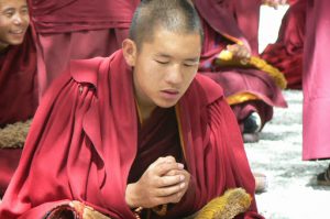 Tibet, Lhasa: a novice monk at Sera Monastery ponders the