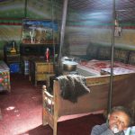 Tibet: child in his tent home at Everest Base Camp.