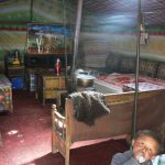 Tibet: child in his tent home at Everest Base Camp.