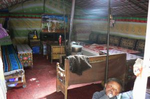 Tibet: child in his tent home at Everest Base Camp.