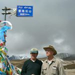 Tibet: Michael and Richard at a mountain road pass  at