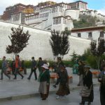 Tibet: Lhasa - Buddhist pilgrims gather daily to  circum-ambulate