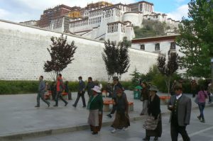 Tibet: Lhasa - Buddhist pilgrims gather daily to  circum-ambulate