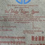 Tibet: Lhasa - carved rock in Tibetan, Chinese and English describing