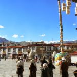 Tibet: Lhasa - Tibetan Quarter of the city; pilgrims walking