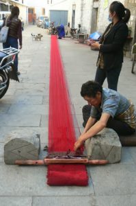 Tibet: Lhasa - Tibetan Quarter of the city;  weaver making