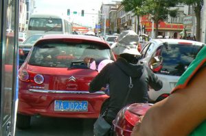 Tibet: Lhasa - Tibetan Quarter of the city;  traffic jam