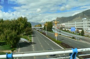 Tibet: Lhasa - modern 6-lane highway built by Chinese