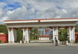 Tibet: Lhasa - entrance to the governing party headquarters; notice Chinese