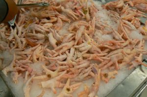 Tibet: Lhasa - Baiyi Supermarket; chicken feet.