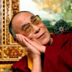 Tibetan spiritual leader in-exile His Holiness the Dalai Lama gestures