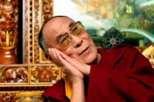 Tibetan spiritual leader in-exile His Holiness the Dalai Lama gestures