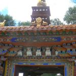 Tibet: Lhasa - Summer Palace Colorful detail on the entry door