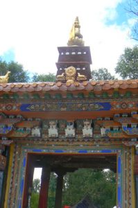 Tibet: Lhasa - Summer Palace Colorful detail on the entry door