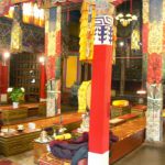 Tibet: Lhasa - Summer Palace Shapden Temple with chanting benches.