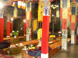 Tibet: Lhasa - Summer Palace Shapden Temple with chanting benches.