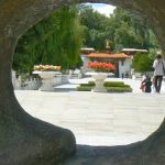 Tibet: Lhasa - Summer Palace entry walk through gate hole.