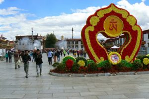 Tibet: Lhasa  Floral decoration in Barkhor Square  with Jokhang Temple