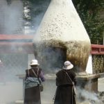 Tibet: Lhasa  Large smoking vat at entry to Jokhang Temple. Pilgrims