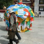 Tibet: Lhasa  Jokhang Temple. Pilgrims walk clockwise around the temple passing prayer