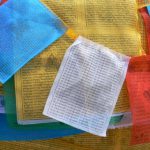 Tibet: Lhasa  Jokhang Temple. Close-up of printing on prayer flags; most often