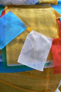 Tibet: Lhasa  Jokhang Temple. Close-up of printing on prayer flags; most often