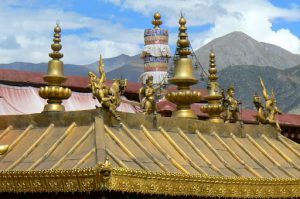 Tibet: Lhasa Ornate statuary on roof of Jokhang Temple.