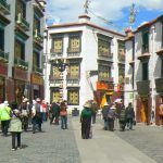 Tibet: Lhasa Outside Jokhang can be seen secular buildings and pilgrims