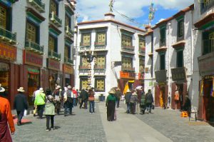 Tibet: Lhasa Outside Jokhang can be seen secular buildings and pilgrims