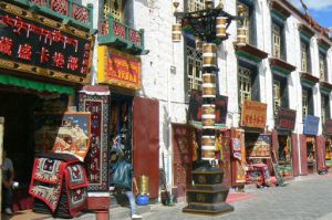 Tibet: Lhasa Outside Jokhang can be seen secular buildings and shops.