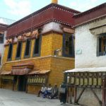 Tibet: Lhasa Outside Jokhang can be seen secular buildings  and this