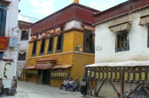 Tibet: Lhasa Outside Jokhang can be seen secular buildings  and this