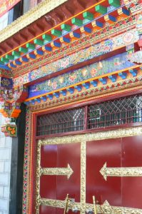 Tibet: Lhasa Ornate doorway.