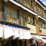 Tibet: Lhasa Typical architecture in Tibet with window frames and awnings.