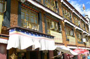 Tibet: Lhasa Typical architecture in Tibet with window frames and awnings.