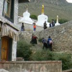 Tibet: Lhasa - Pabonka Monastery.  Pilgrims climbing steps to the