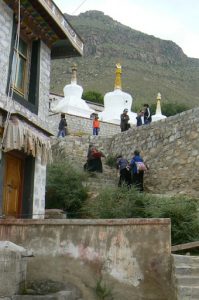 Tibet: Lhasa - Pabonka Monastery.  Pilgrims climbing steps to the