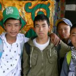 Tibet: Lhasa - Pabonka Monastery.  Young local visitors.
