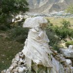 Tibet: Lhasa - Pabonka Monastery.  Small stone stupa wrapped in