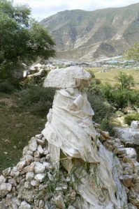 Tibet: Lhasa - Pabonka Monastery.  Small stone stupa wrapped in