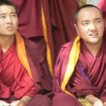 Tibet: Lhasa - Sera Monastery. Students listening to a question thrown