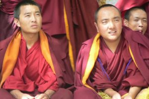 Tibet: Lhasa - Sera Monastery. Students listening to a question thrown
