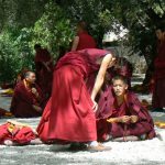 Tibet: Lhasa - Sera Monastery. The debate is vigorous with teachers