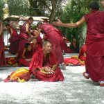 Tibet: Lhasa - Sera Monastery. Teachers are very animated with arms