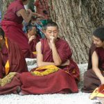 Tibet: Lhasa - Sera Monastery. Facial reactions range from contemplative  to