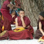 Tibet: Lhasa - Sera Monastery. Facial reactions range from contemplative  to